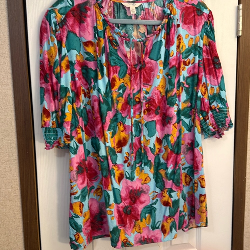 Women’s blouse. Multi color floral